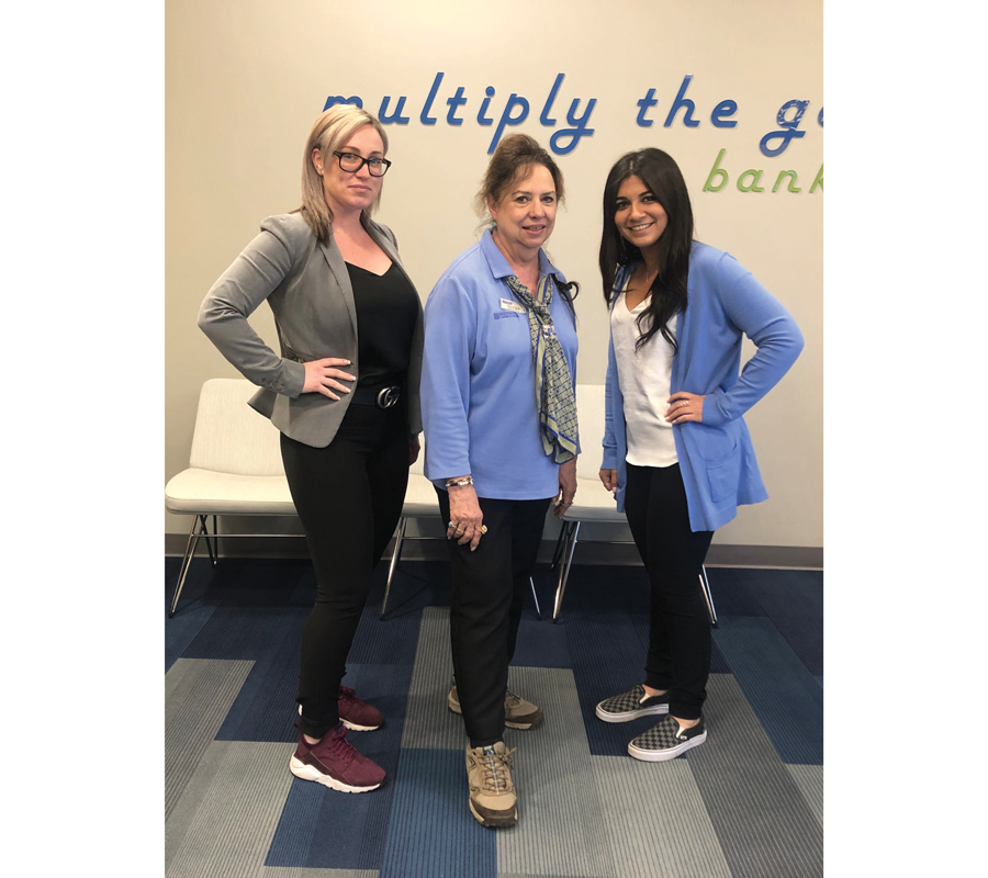 Employees wearing sneakers for Lace Up for a Cure 2019.